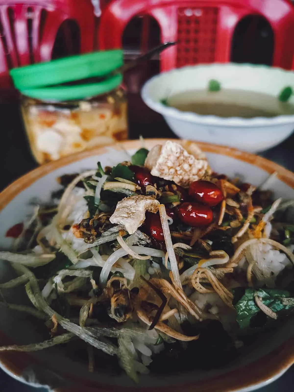 Vietnamese Food Guide: What to Eat in Vietnam Com hen in Hue, a delicious Vietnamese dish made with baby clams