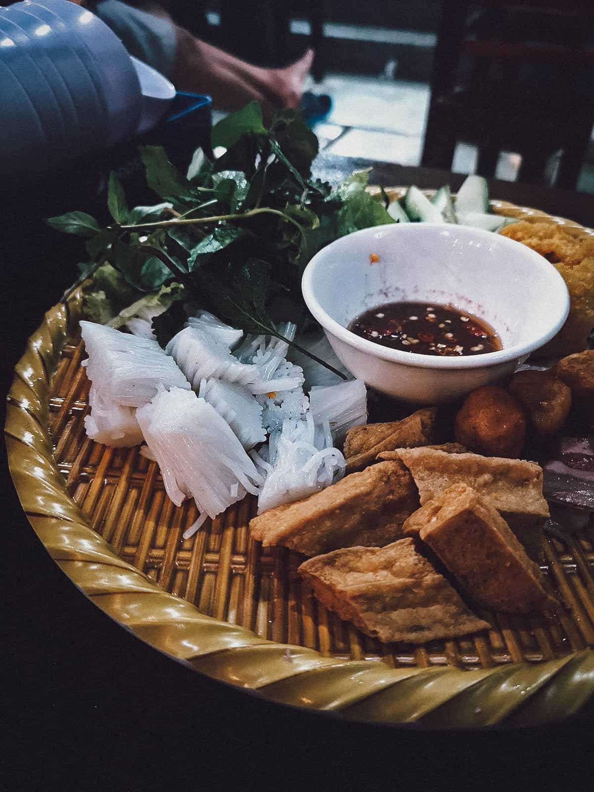 Tray of Vietnamese food at Dau Bac restaurant in Hoi An