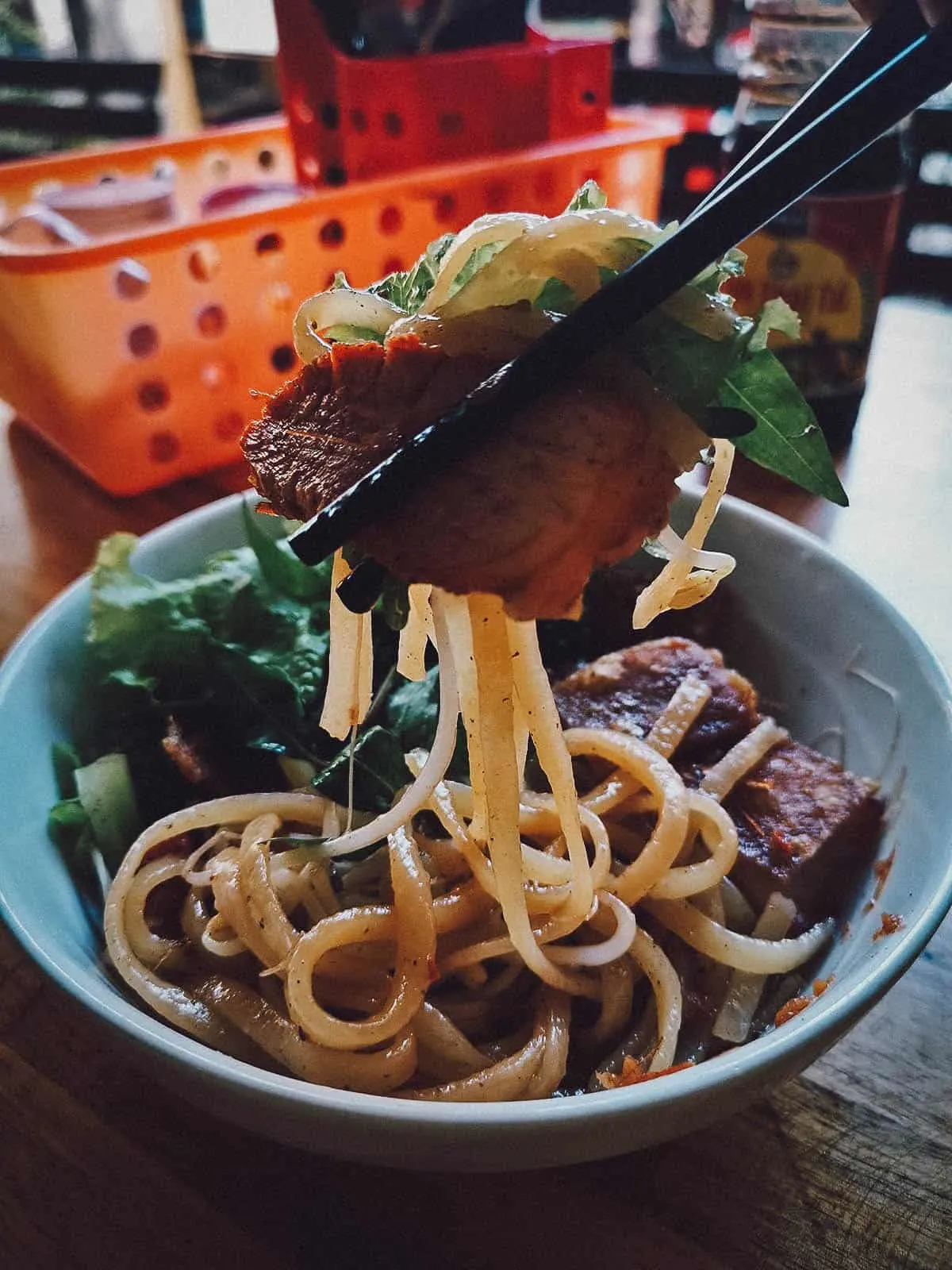 Slice of grilled pork at Ty Cao Lau restaurant in Hoi An