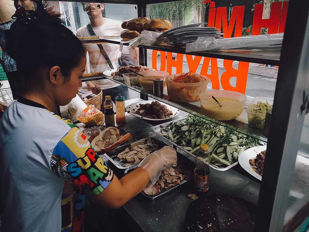 Making banh mi at Banh Mi Bay Ho in Saigon