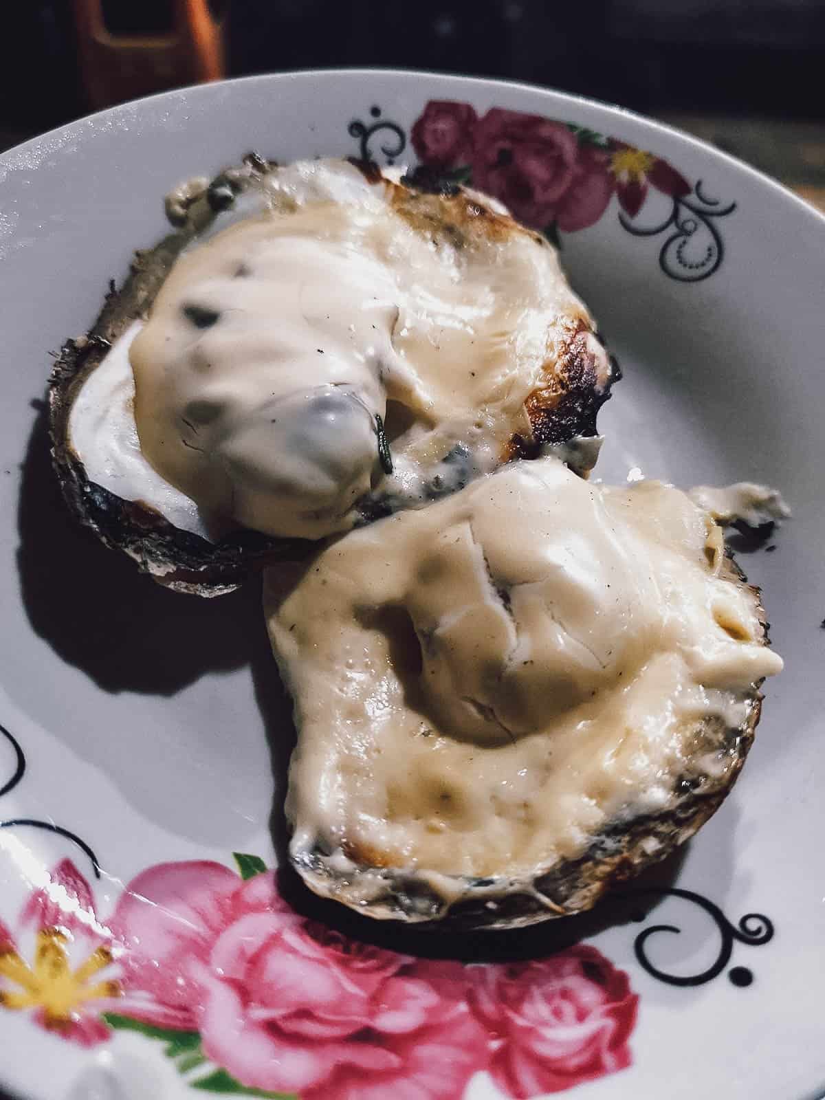 Oysters with cheese at Oc Loan in Saigon