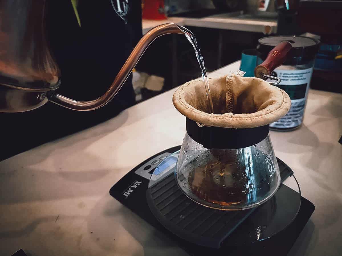Instagrammable Cafes in Hoi An, Vietnam Brewing coffee at Phin Coffee in Hoi An, Vietnam
