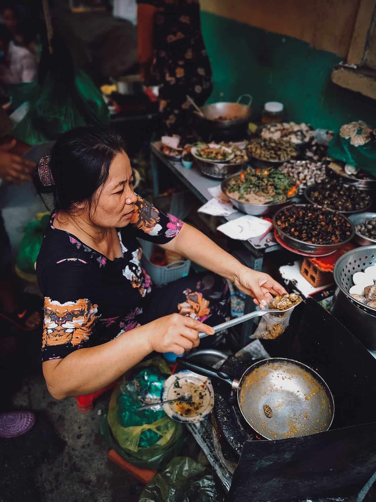 Snail lady in Ho Chi Minh City