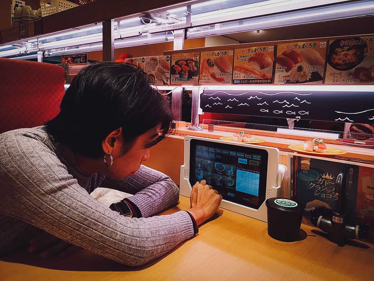 Ordering from the ipad menu at Sushiro in Tokyo, Japan