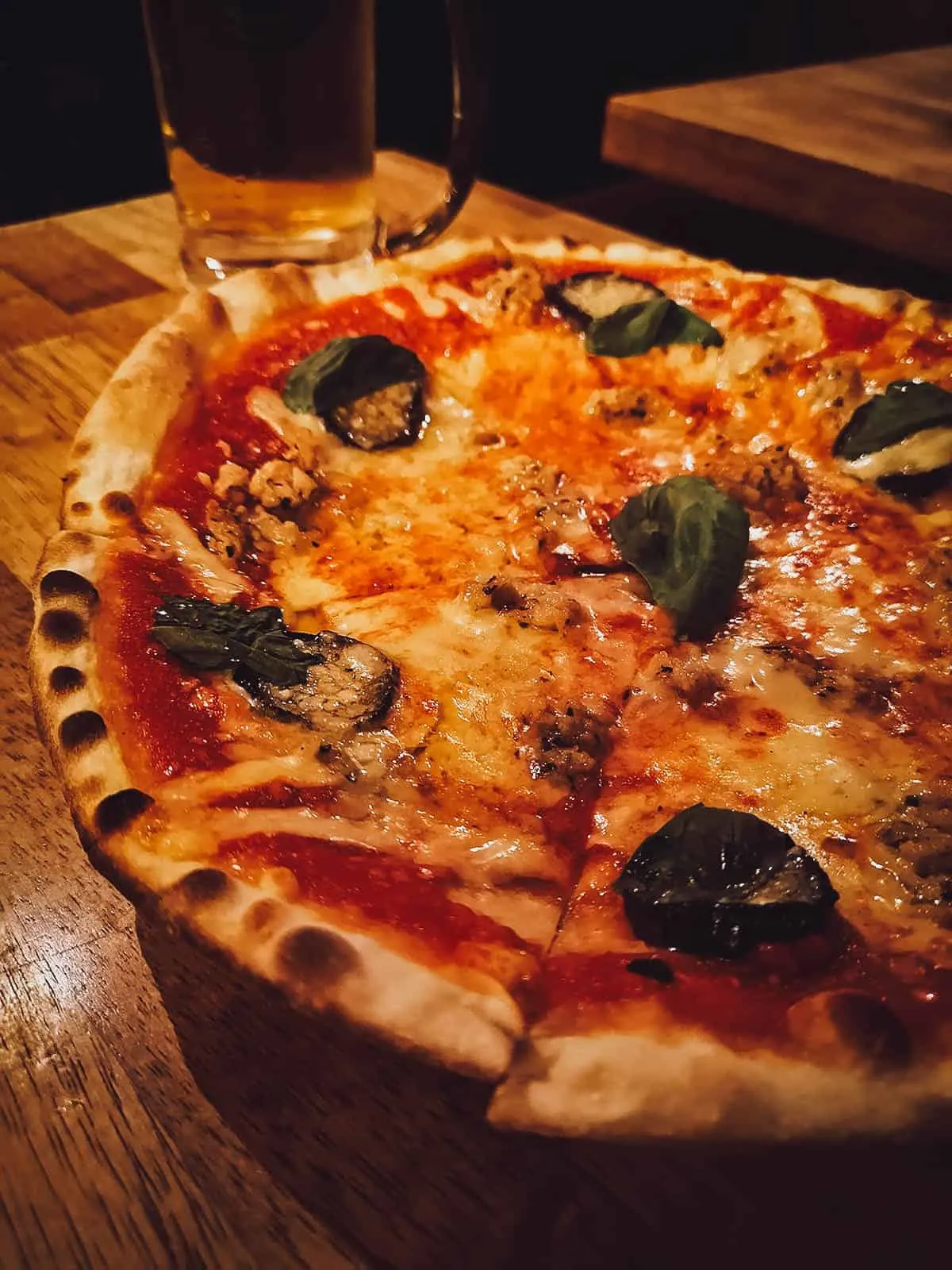 Pizza and beer at Ueno 500 Bar in Tokyo, Japan