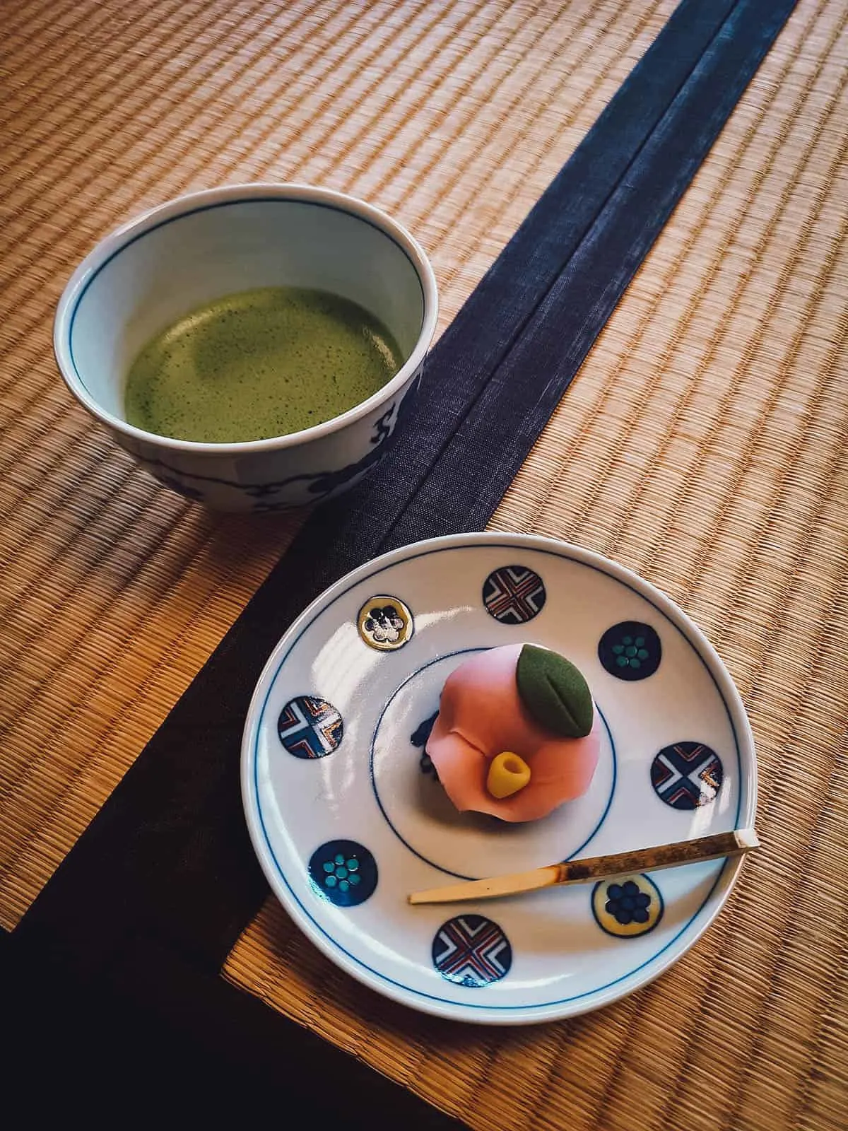 Cup of matcha tea and wagashi at a restaurant in Kanazawa
