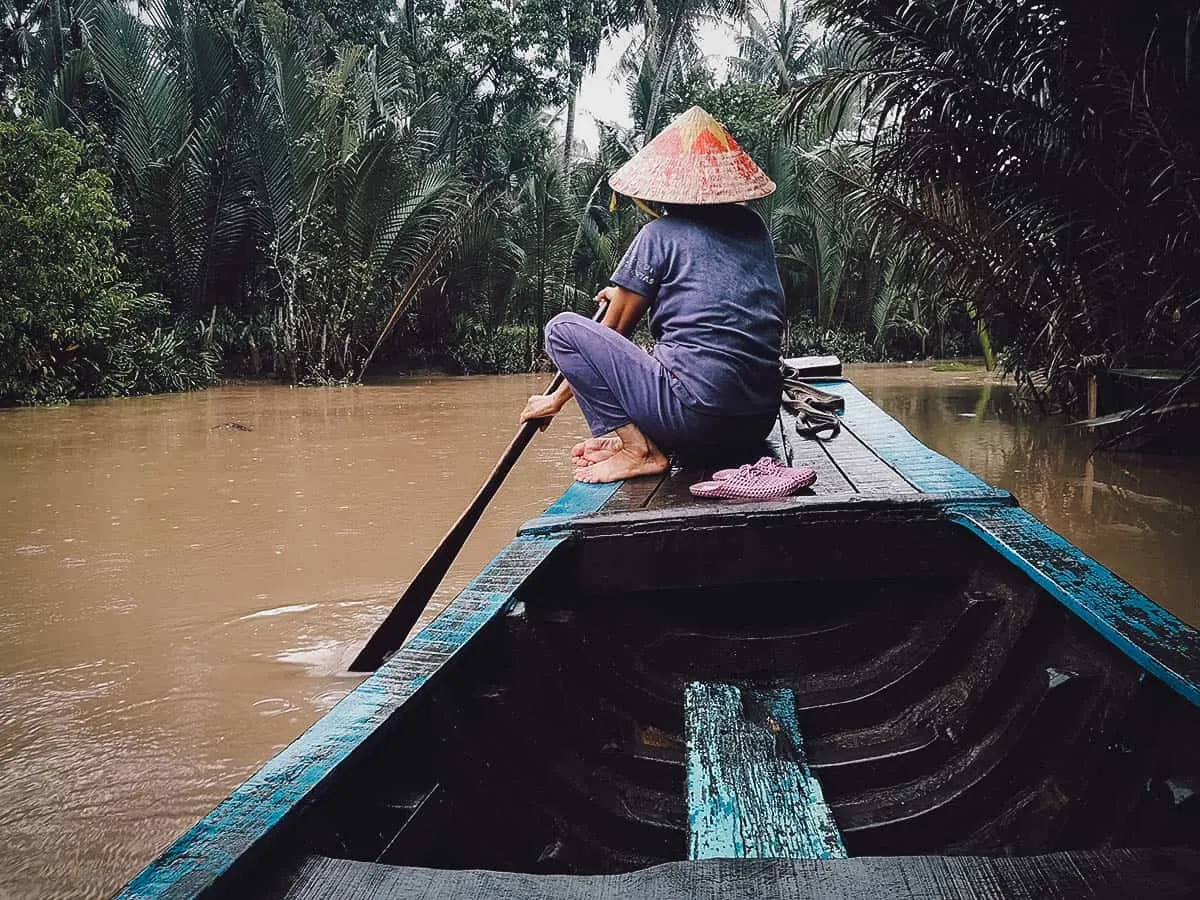 Riding a boat on the Mekong River