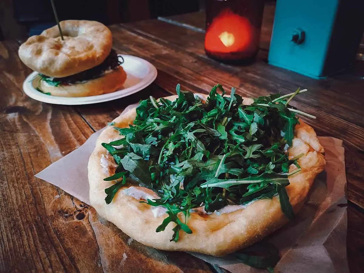 Langos with arugula in Budapest, a classic Eastern European dish