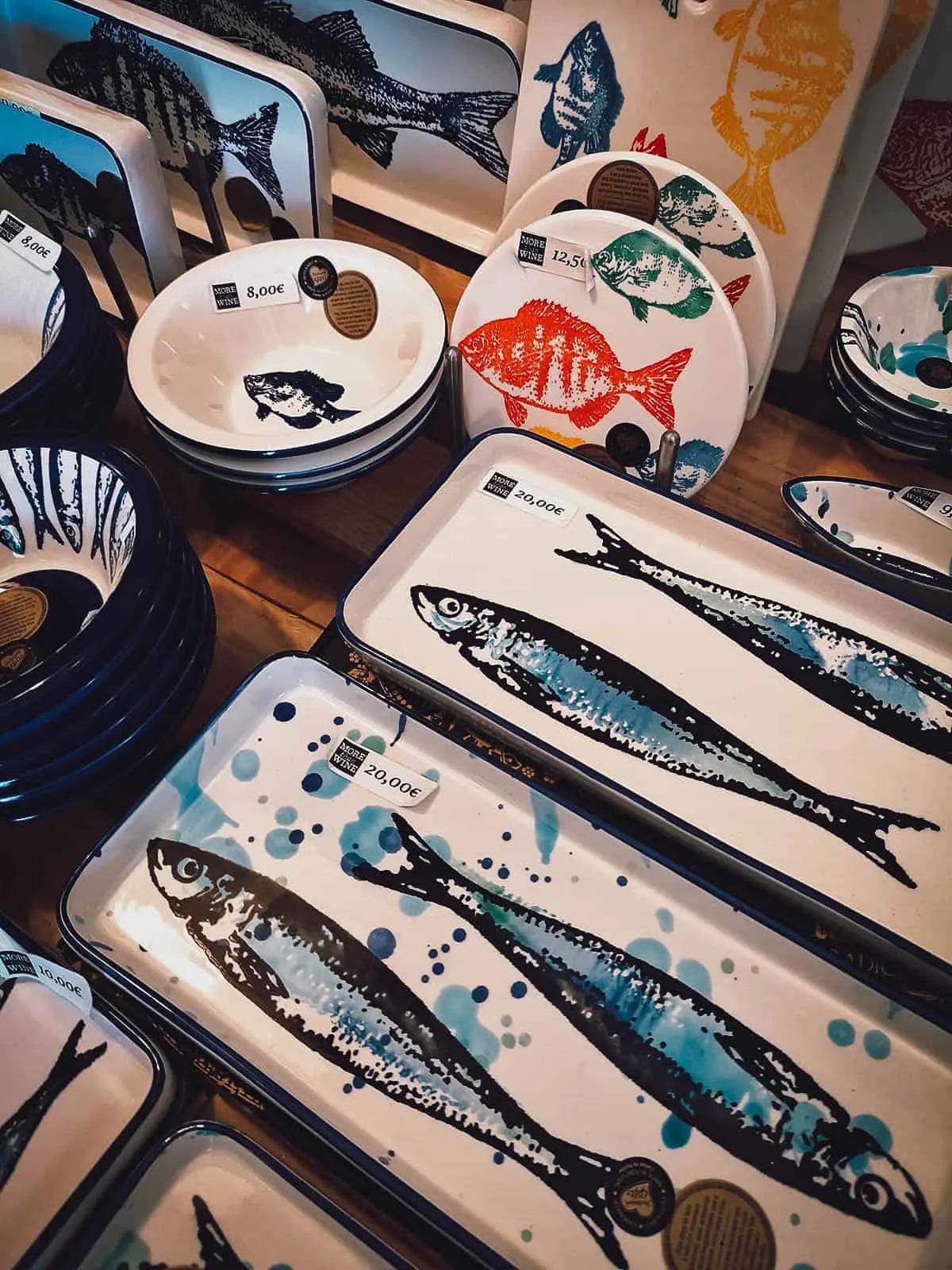 Plates, bowls, and trays with fish designs