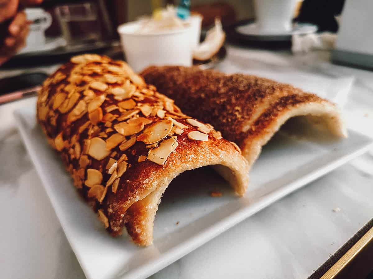 Hungarian chimney cakes with almonds and cinnamon at Molnar's Kurtoskalacs in Budapest, Hungary