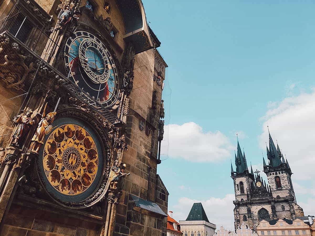 Astronomical Clock in Prague's Old Town Hall with Our Lady before Týn in the background