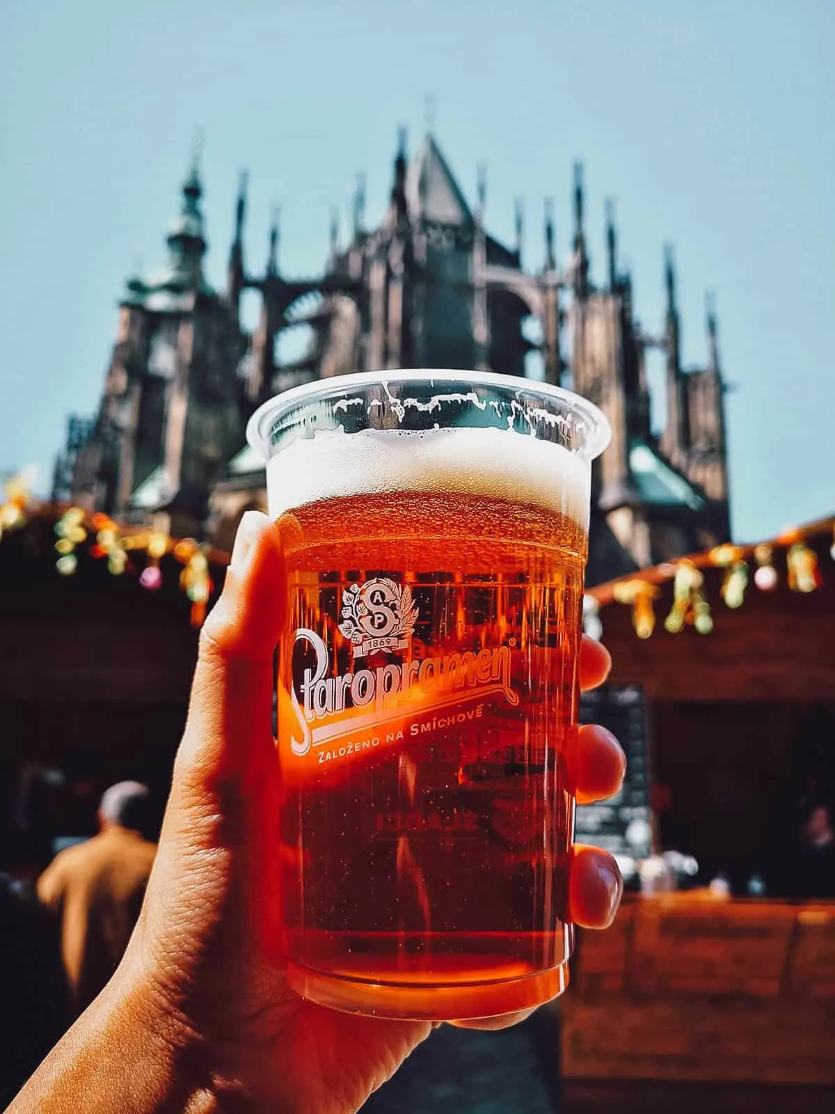 Drinking beer in front of St. Vitus Cathedral in Prague