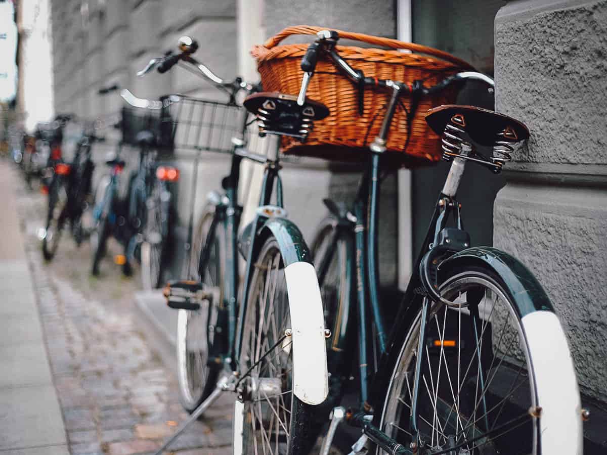 Bikes resting against a wall