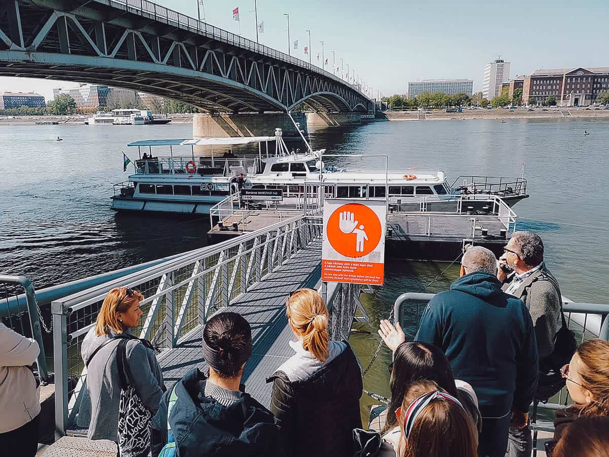 Waiting to board the ferry at Boraros Ter along the Danube River in Budapest, Hungary