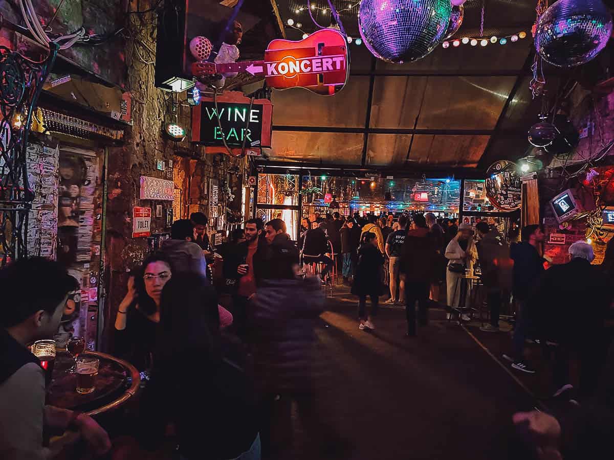 Nightlife scene inside Szimpla Kert ruin bar in Budapest, Hungary