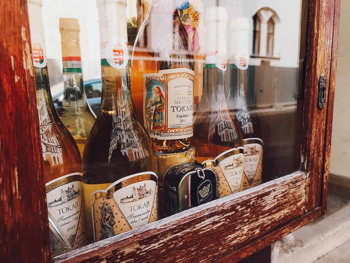 Budapest Travel Guide Bottles of tokaji behind a glass display