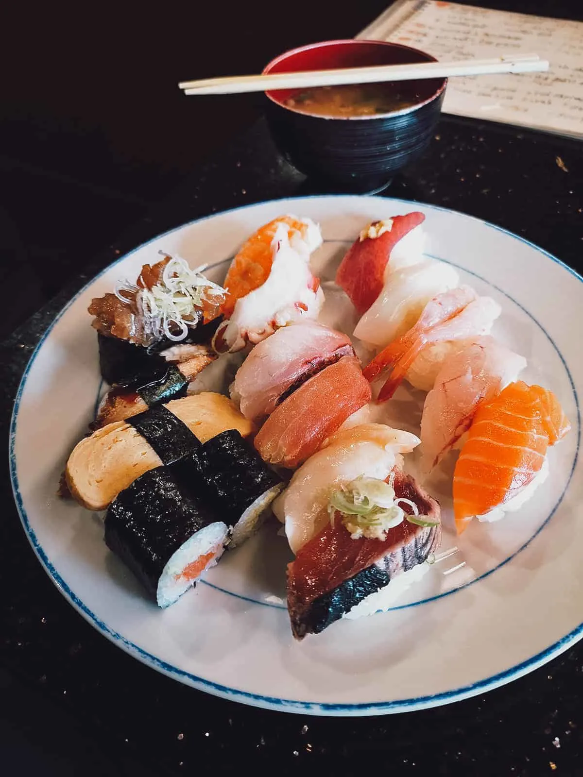 Plate of sushi, the classic Japanese dish of raw fish served with vinegared sushi rice