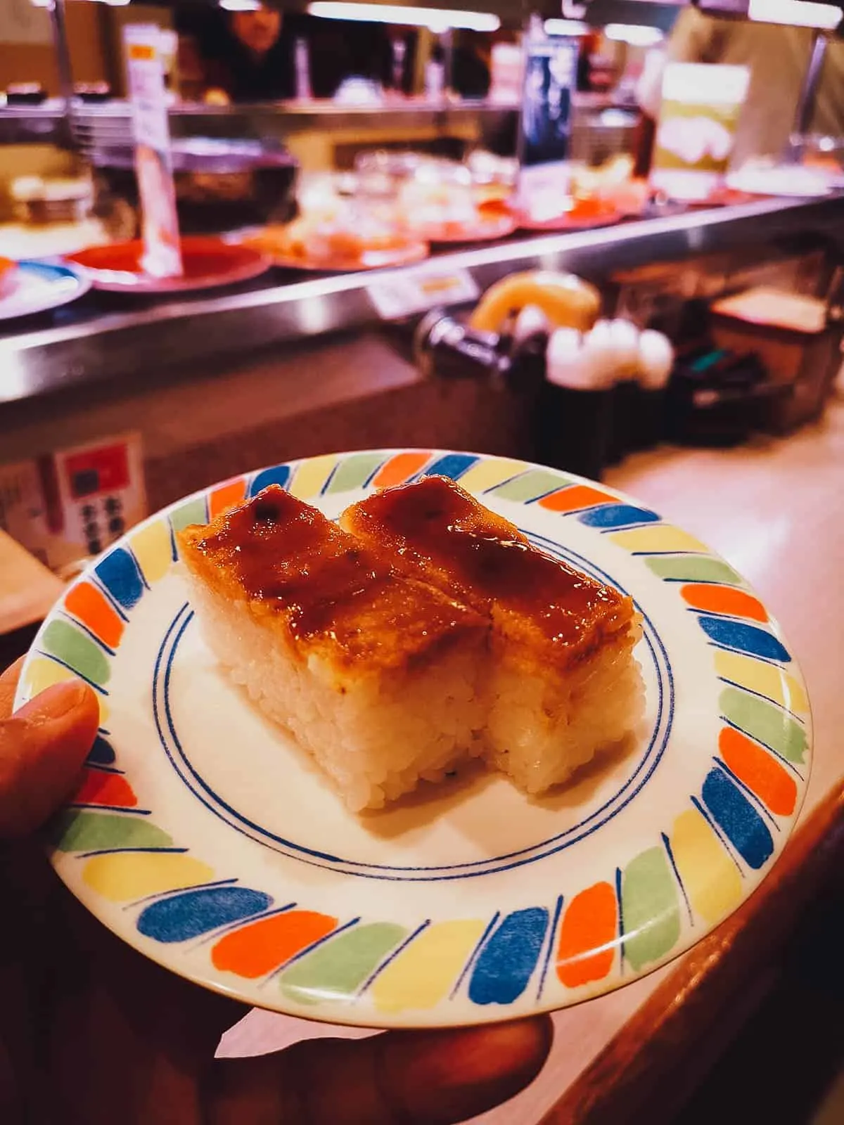 Oshizushi at a kaitenzushi Japanese restaurant