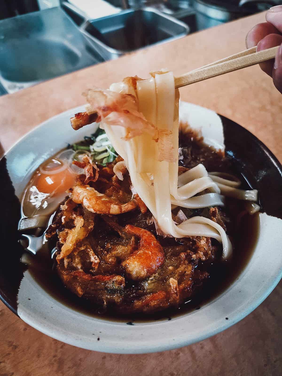 Kishimen topped with bonito flakes, a type of udon popular in Nagoya