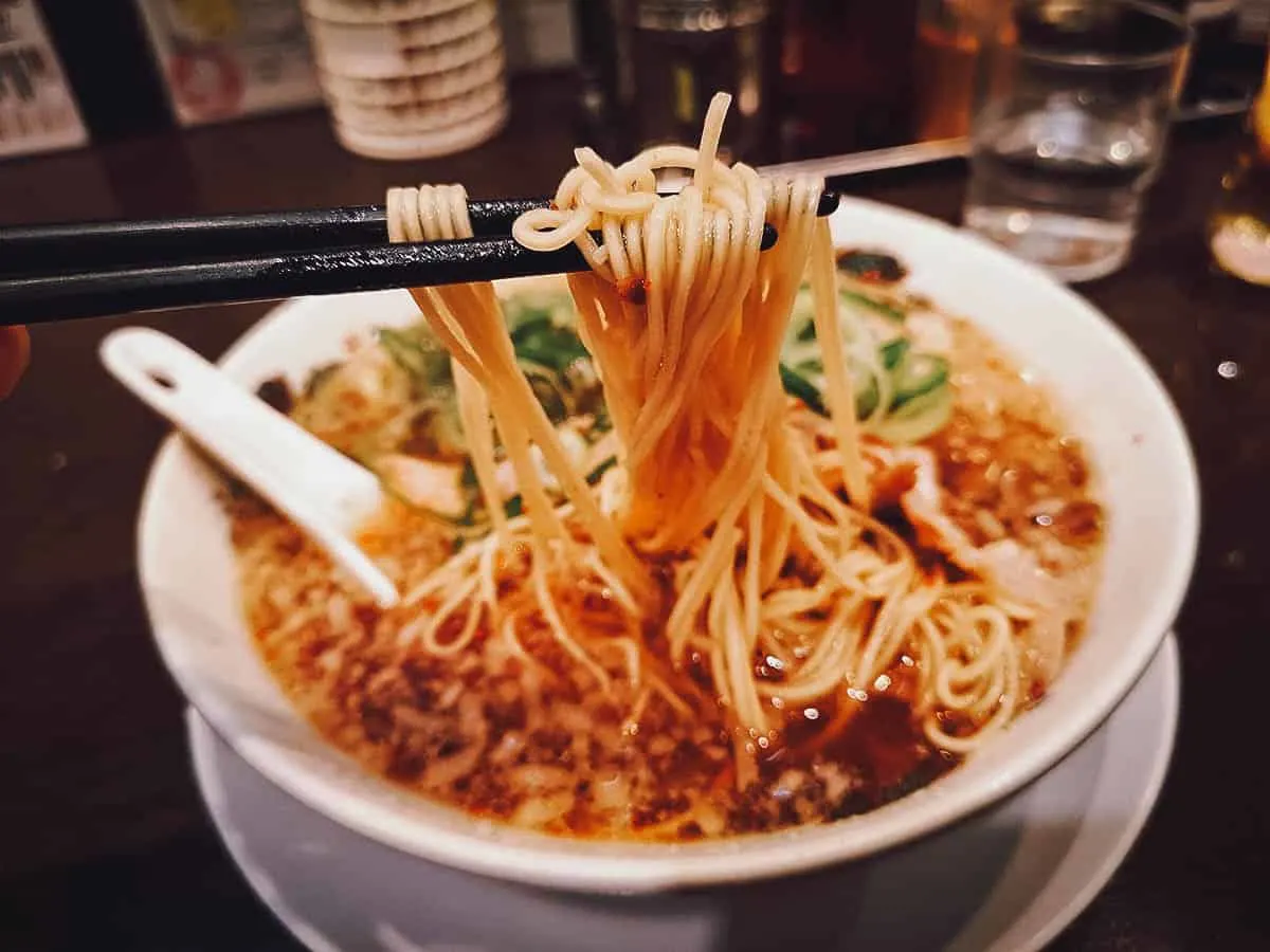 Picking up ramen noodles at a restaurant in Kyoto