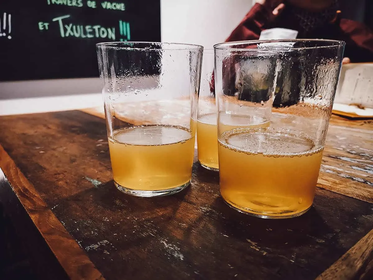 Spanish Food Guide: 45 Dishes to Eat in Spain Basque Cider from a Spanish bar in San Sebastian