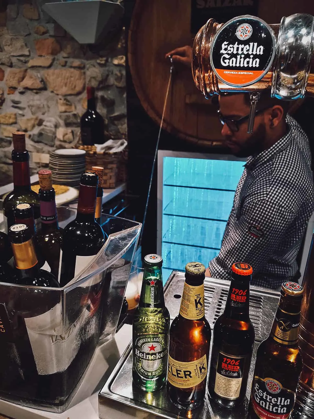 Bartender pouring cider