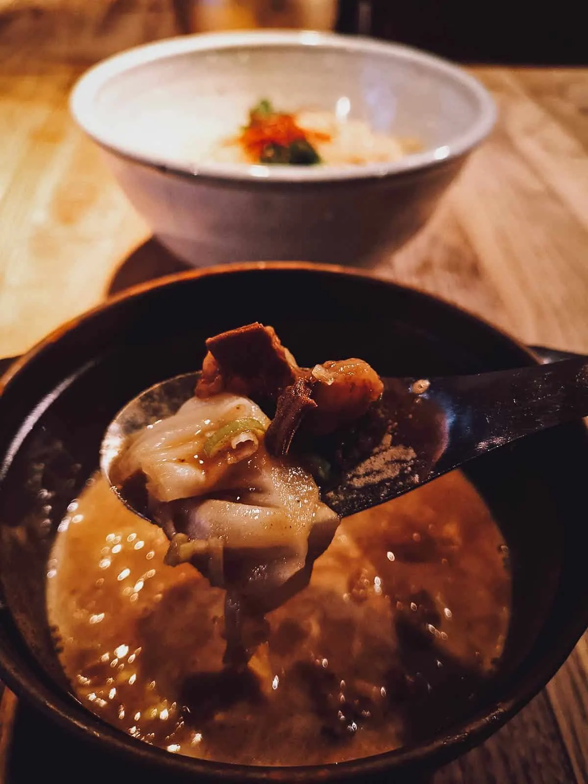 Spoonful of motsu at a restaurant in Kyoto