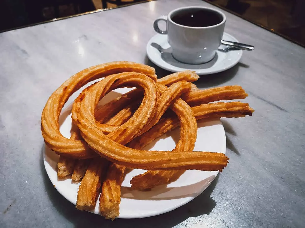 Churros with hot chocolate at a cafe in Madrid, Spain