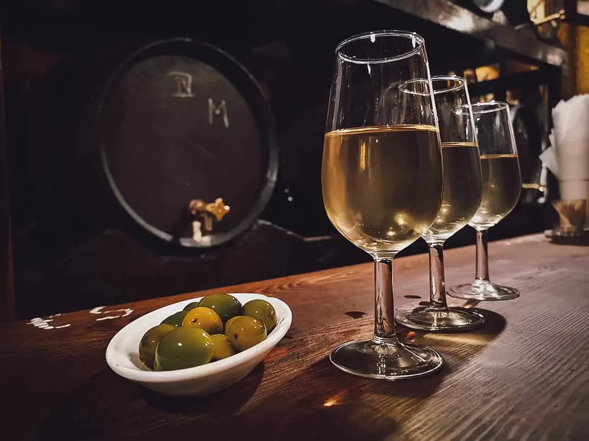 Madrid Travel Guide in Photos: Glasses of sherry with olives at La Venencia in Madrid, Spain