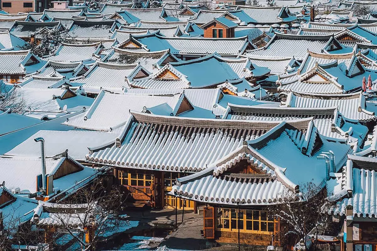 Traditional Korean houses covered in snow
