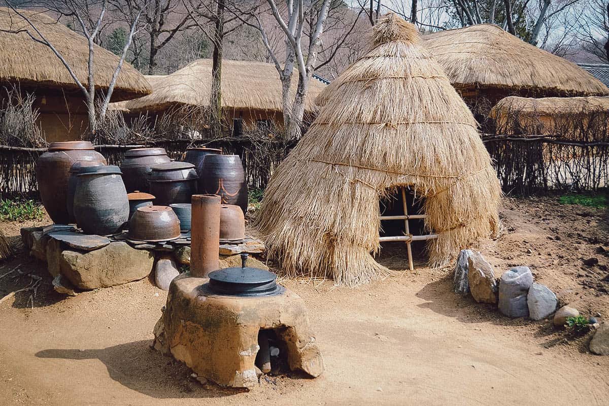 Straw hat and kimchi barrels