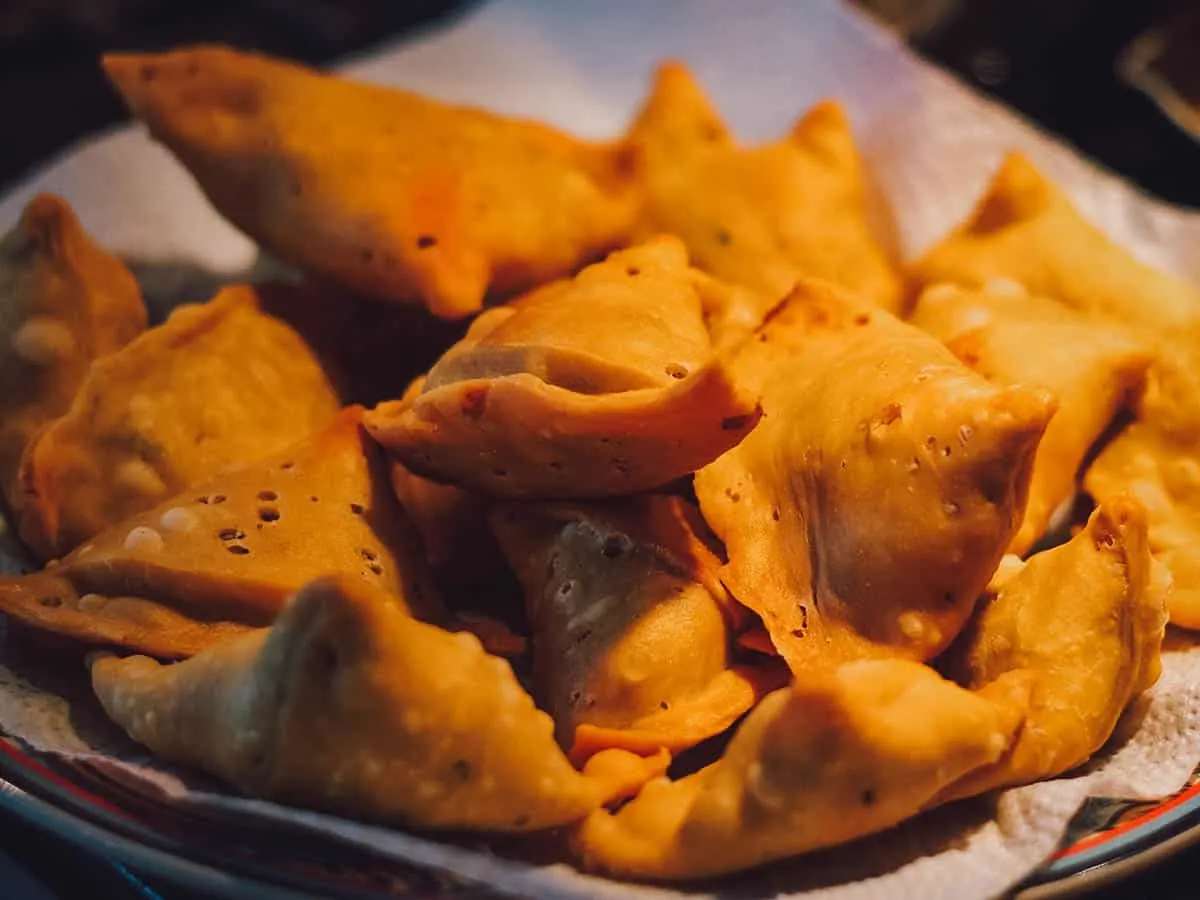 Plate of samosas, one of the most famous street food dishes in India