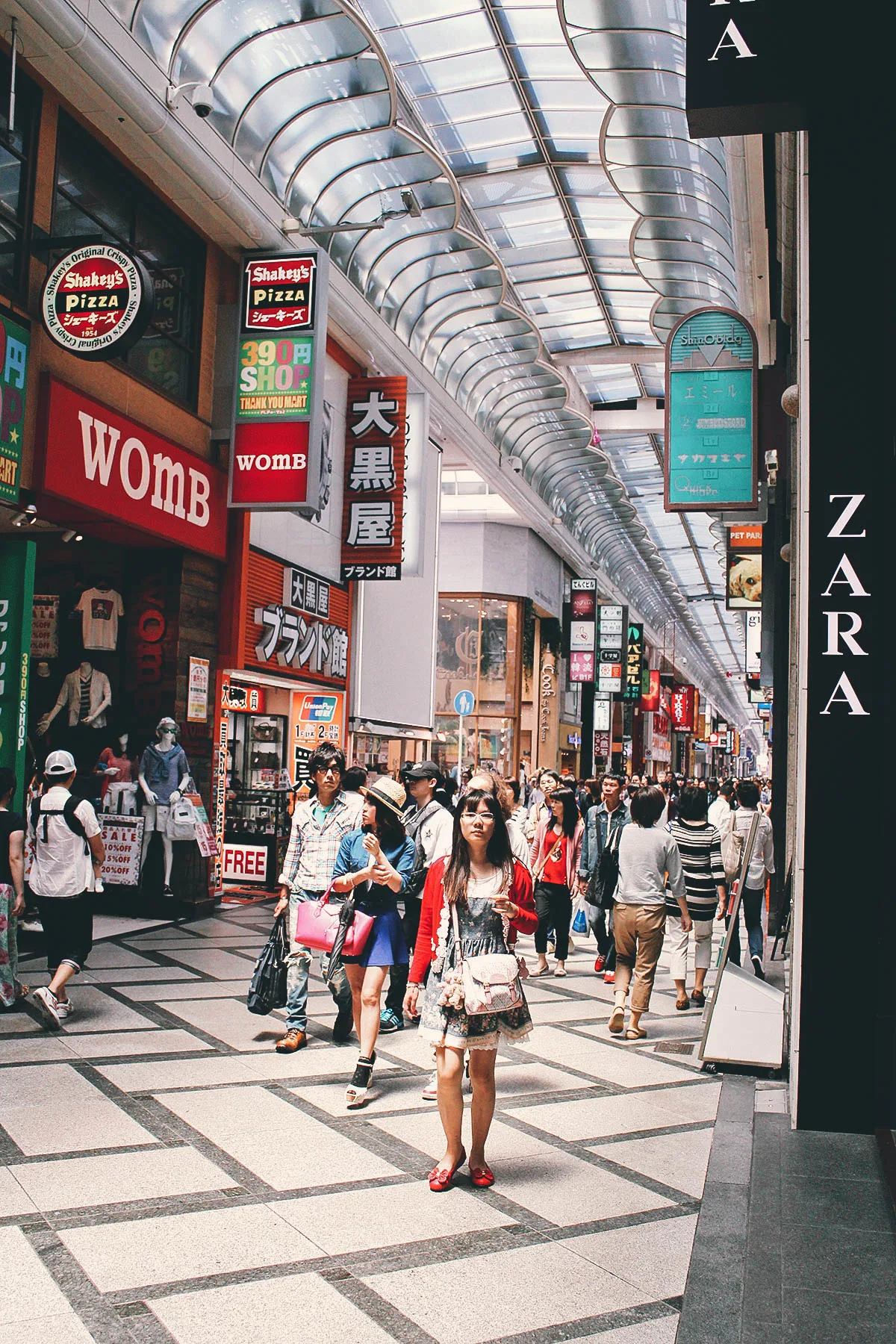 Walking through Shinsaibashi shopping arcade in Osaka