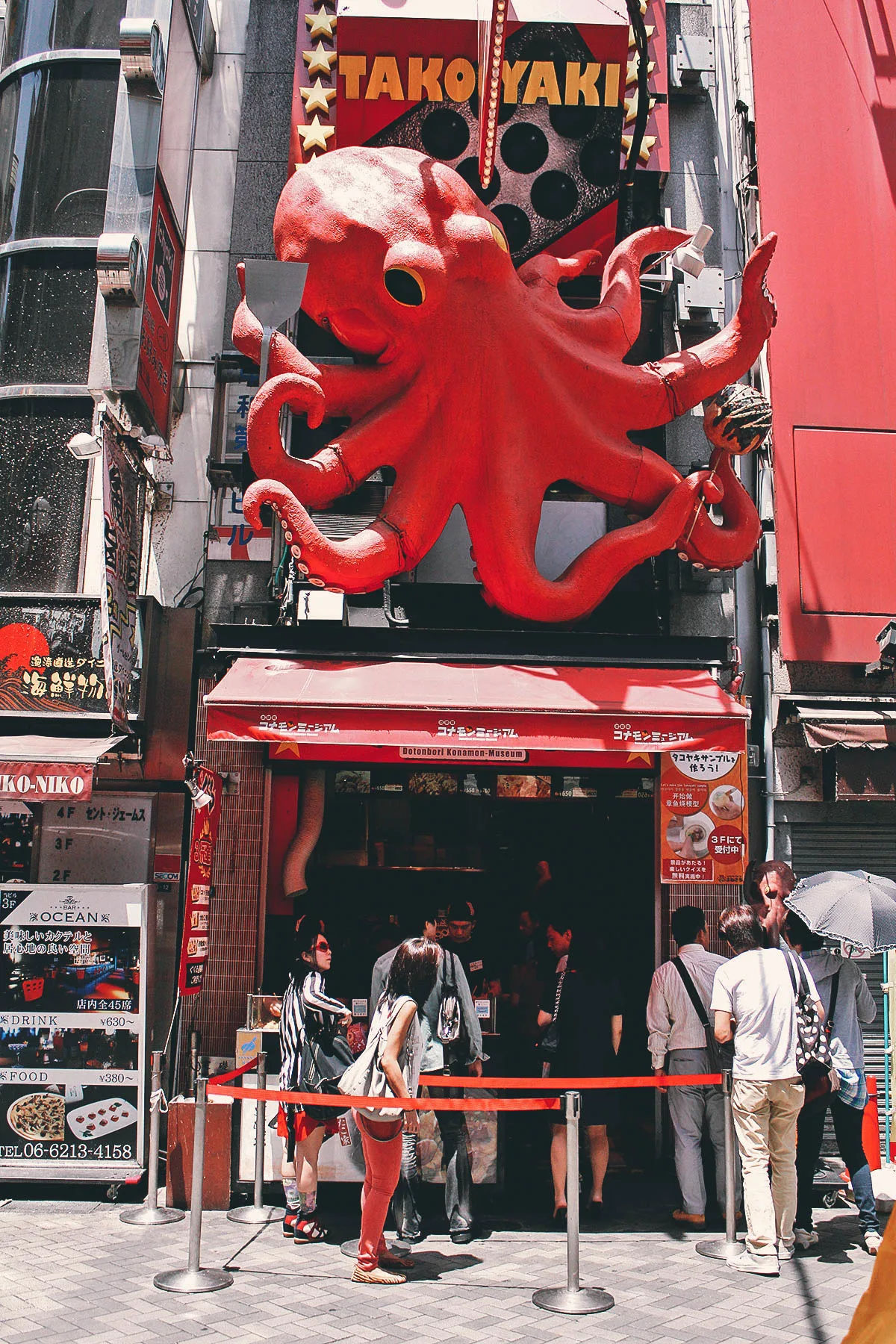 Japanese Street Food Takoyaki stand in Dotonbori, Osaka, Japan