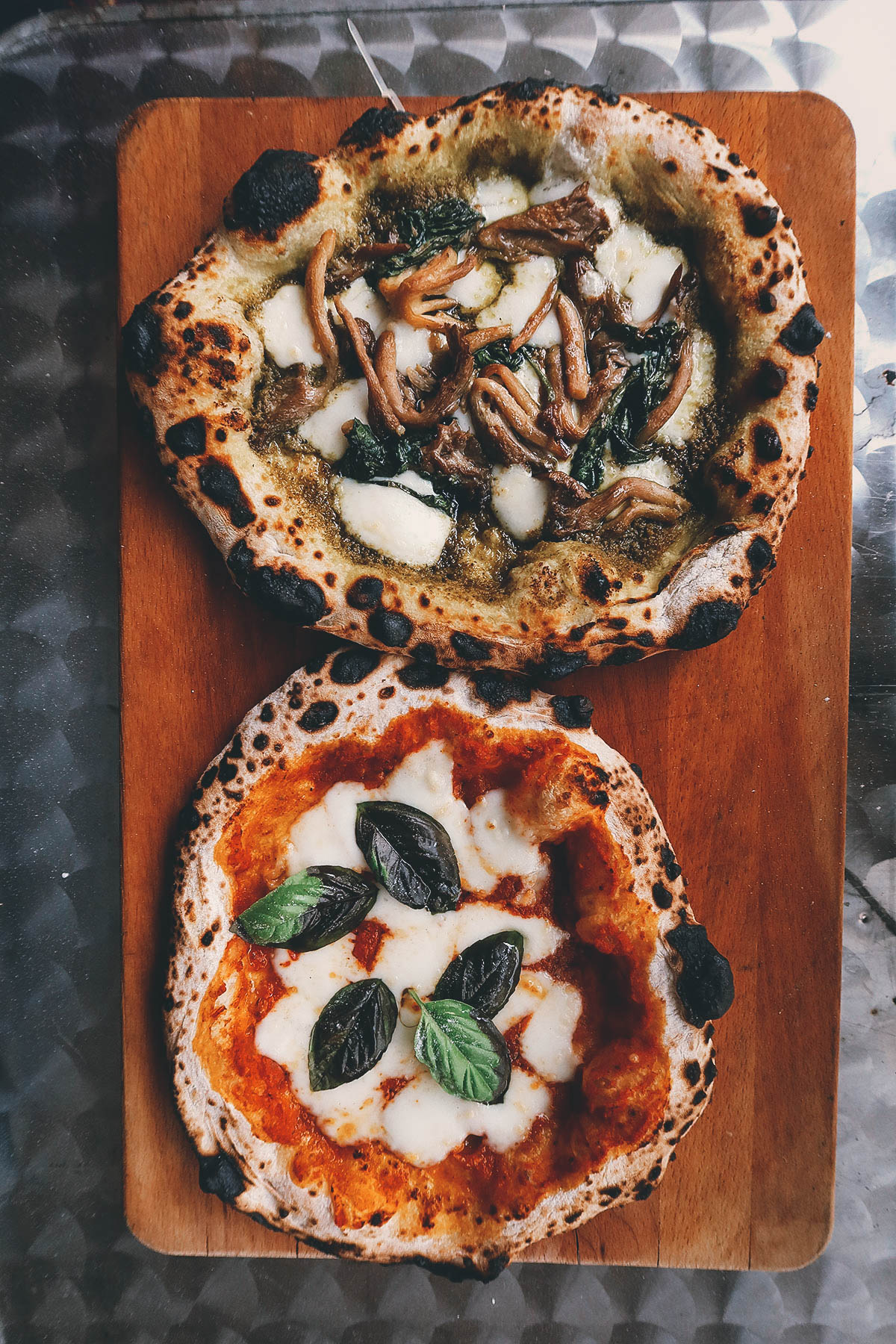 Two Neapolitan-style pizzas