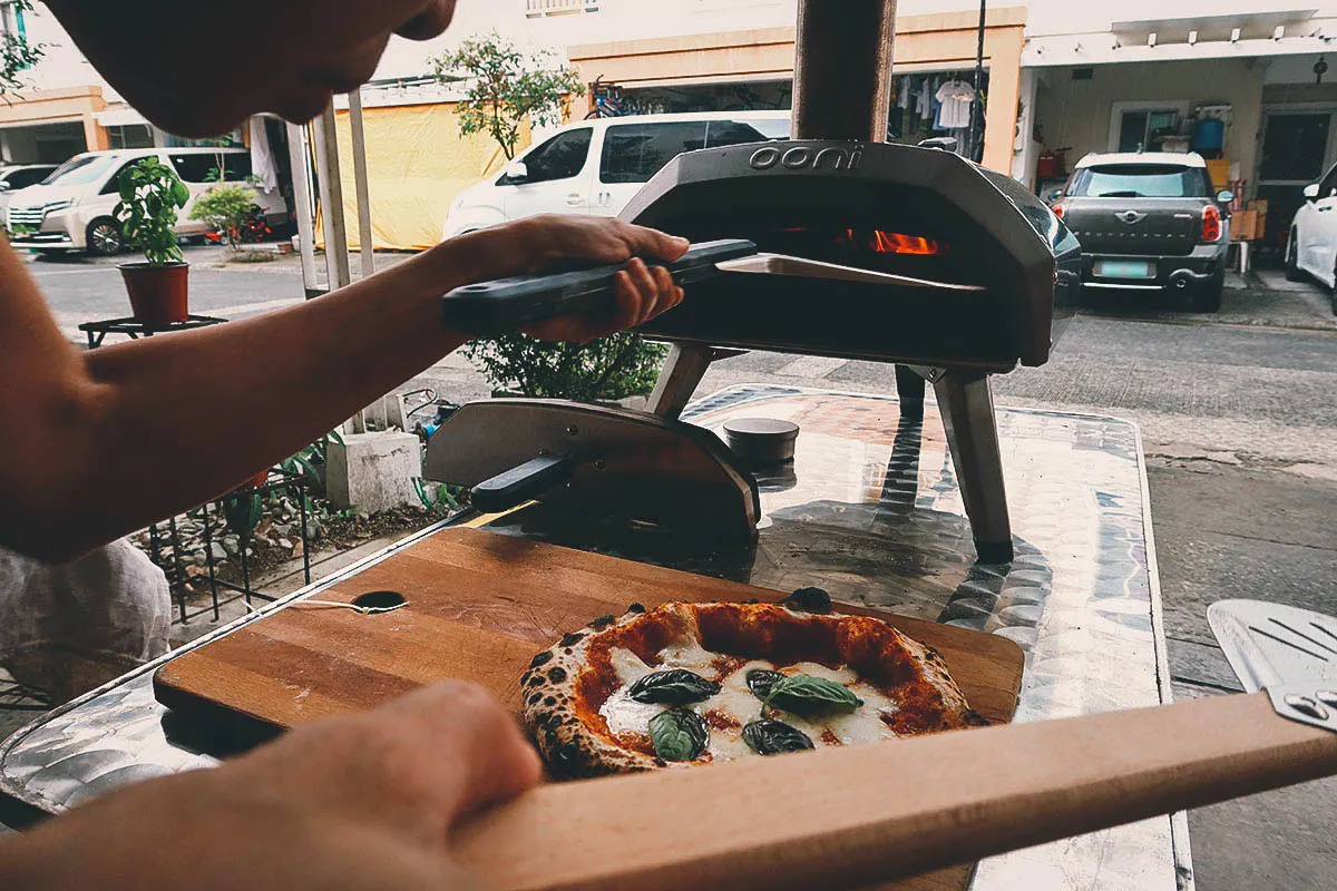 Cooking pizza in an Ooni pizza oven