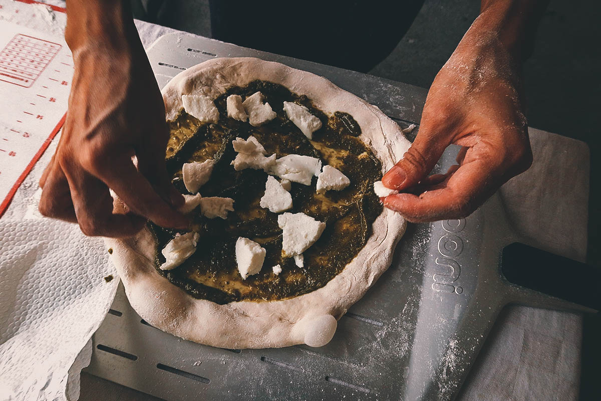 Assembling the pizza