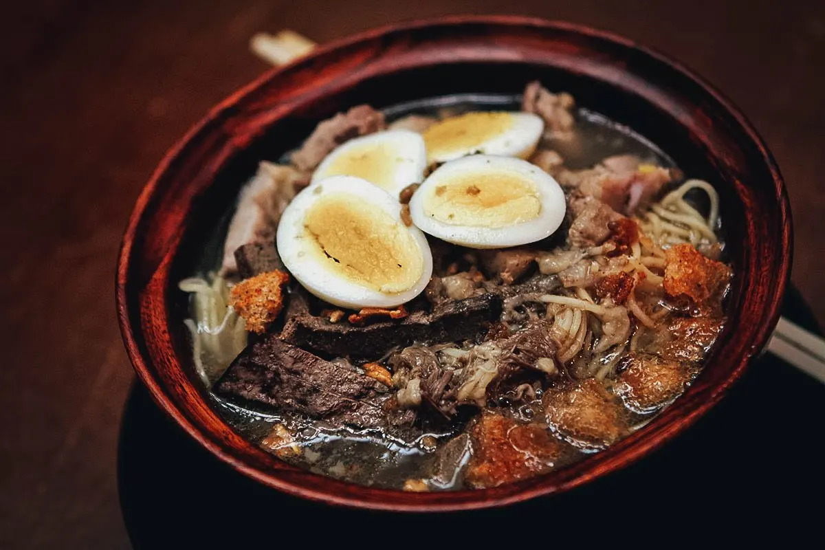 Batchoy topped with hard-boiled eggs, a popular noodle dish in the Philippines