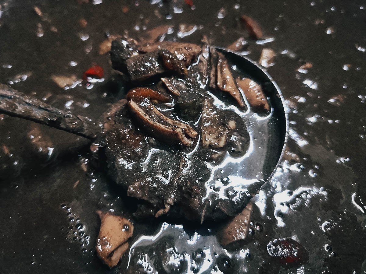 Dinuguan with rice cake, an interesting dish in the Philippines