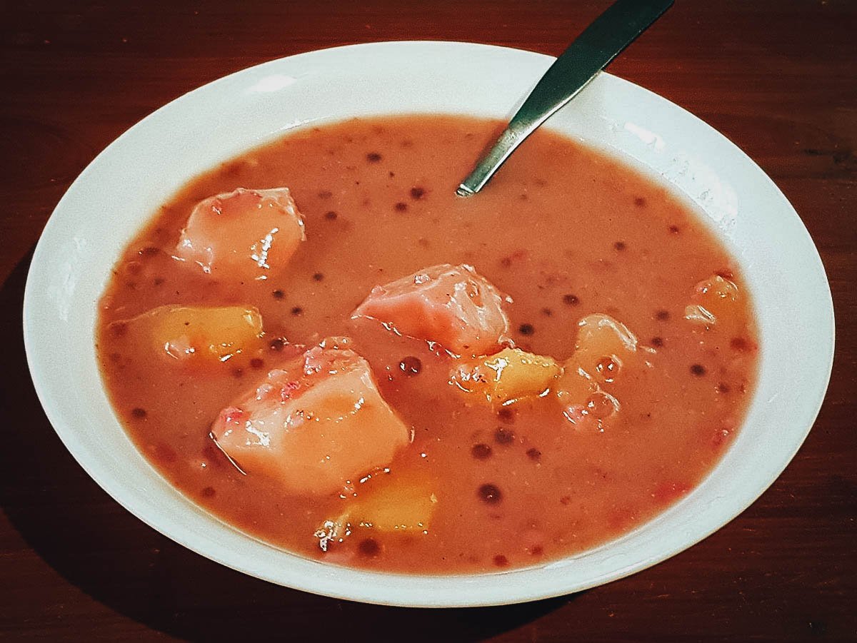 Ginataang bilo-bilo with sweetened coconut milk, sticky rice balls, tapioca pearls, and sweet potato chunks