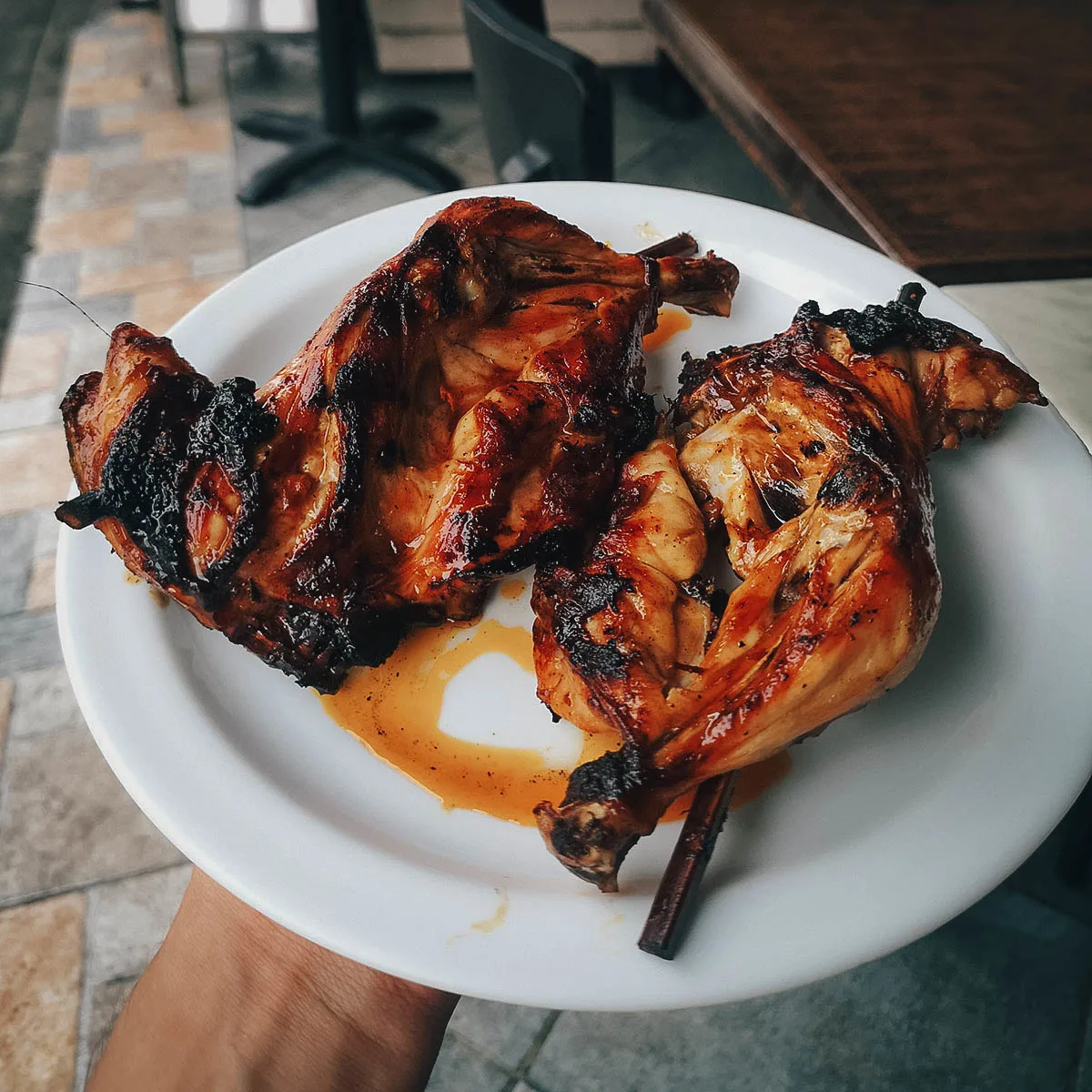 Filipino Food Guide Chicken inasal with soy sauce and vinegar, a popular dish in the Philippines