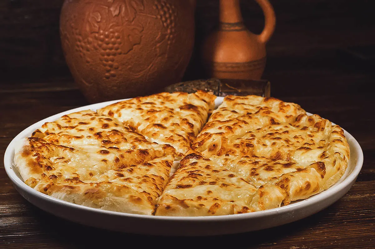 Georgian Food Megruli, a Georgian national dish consisting of cheese-filled bread