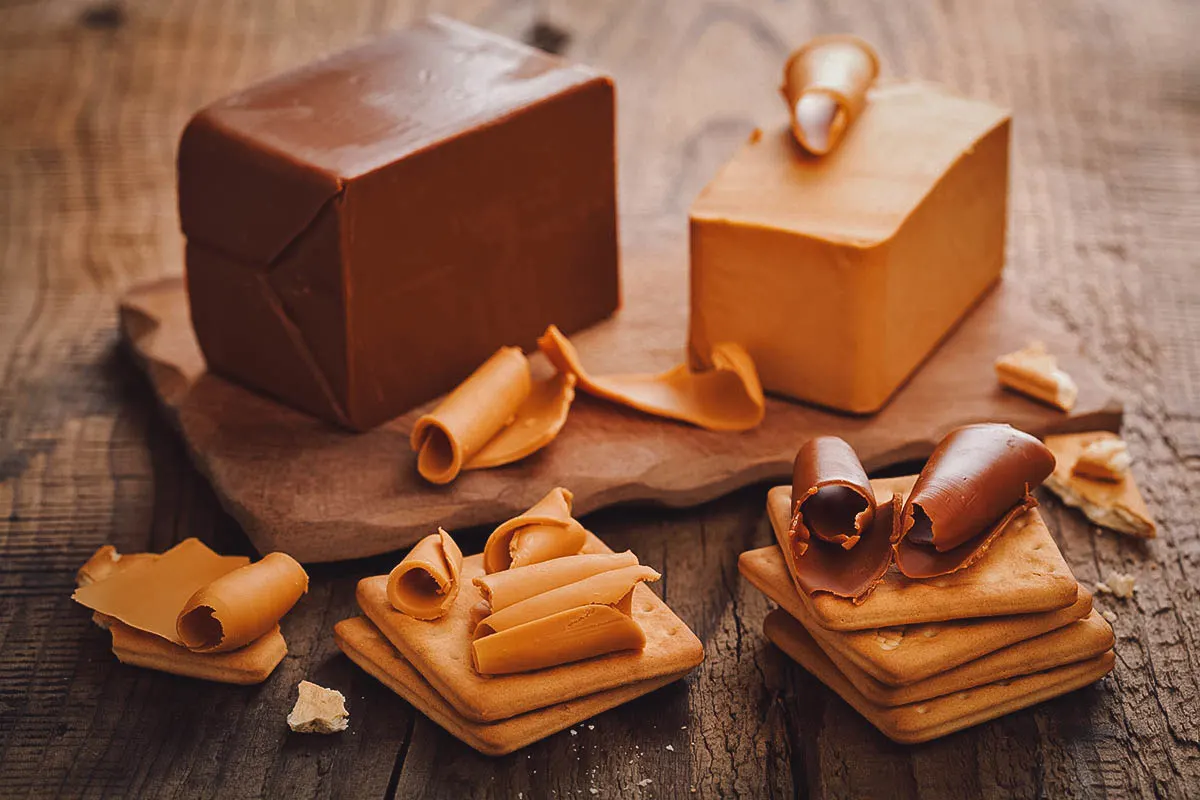 Norwegian Food Blocks of brunost or Norwegian brown cheese, a traditional food in Norway
