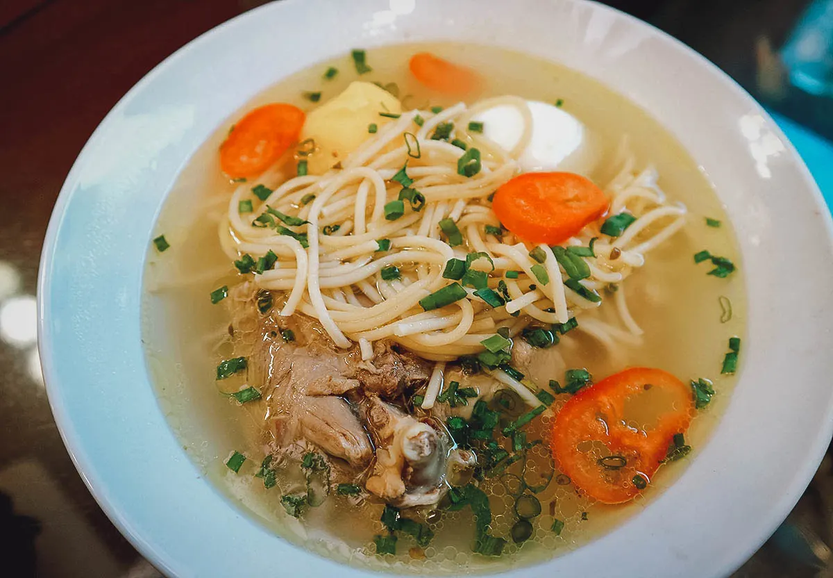 Caldo de Gallina, a type of Peruvian chicken noodle soup