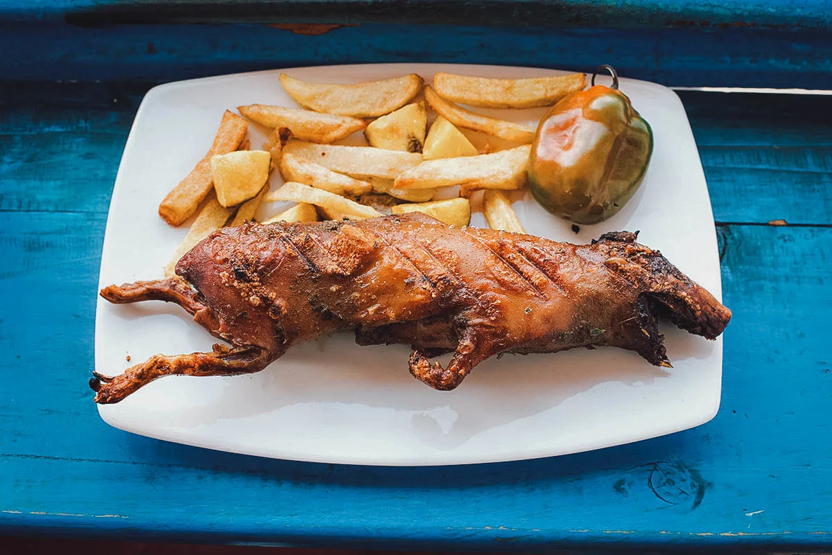 Peruvian Food Cuy (guinea pig) with fries, one of the most bizarre but popular Peruvian foods