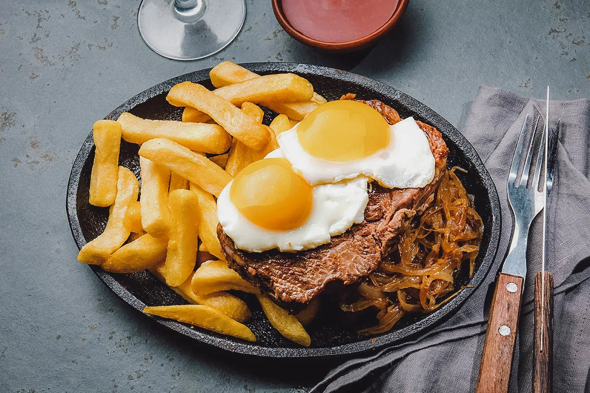 Peruvian Food Lomo a lo pobre, a signature dish in Peruvian cuisine