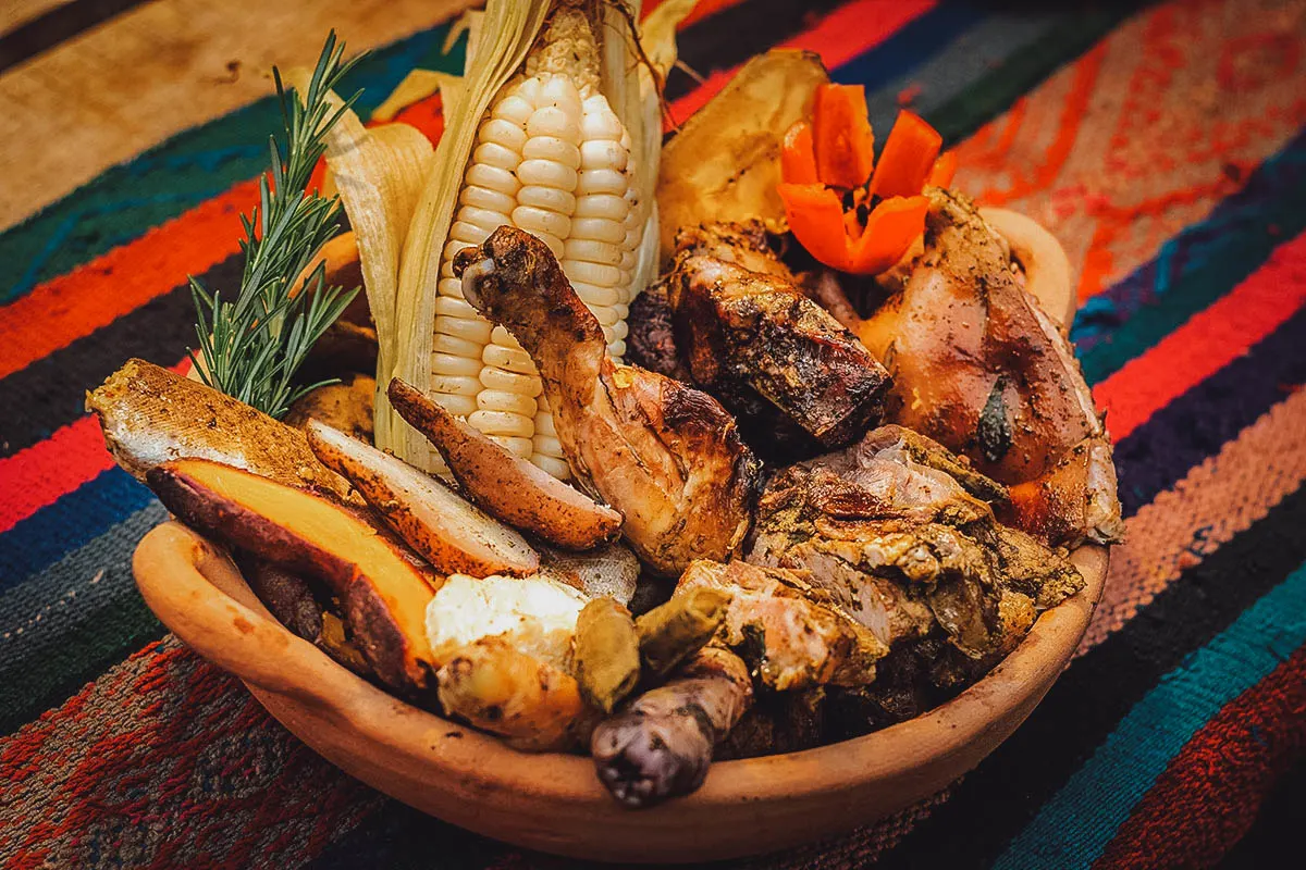 Peruvian Food Carapulcra with alpaca meat, cuy (guinea pig), llama, sweet potatoes, and corn kernels