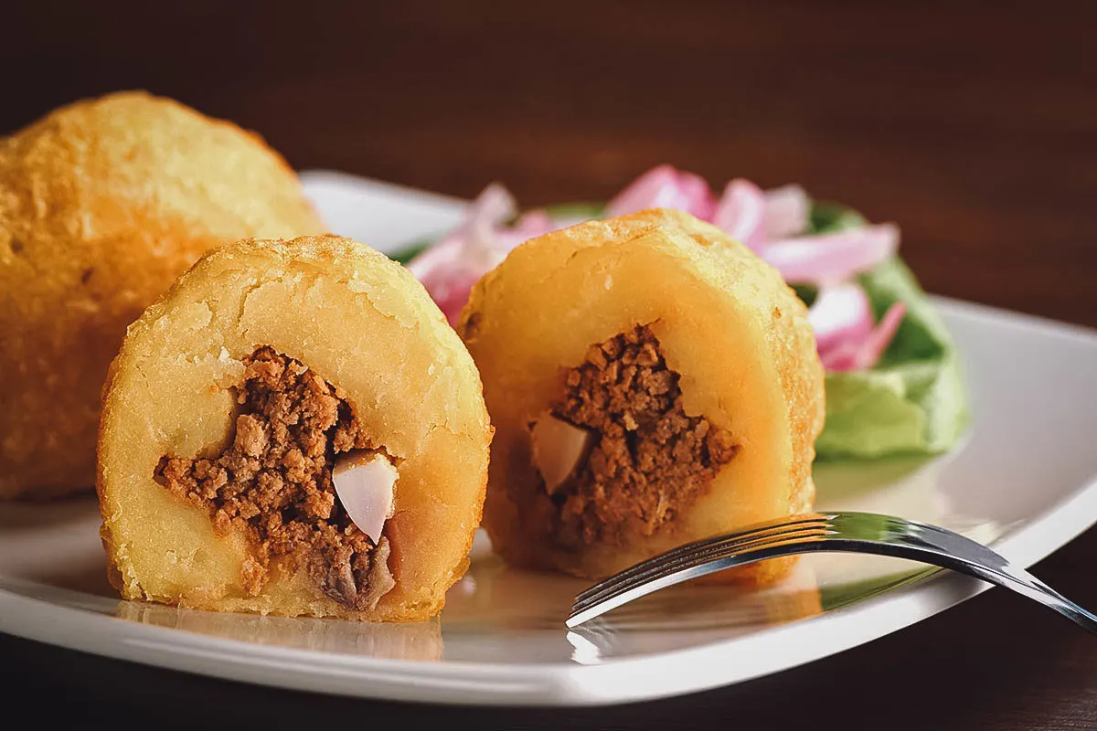 Peruvian Food Papa rellena, a type of Peruvian croquette made with ground beef