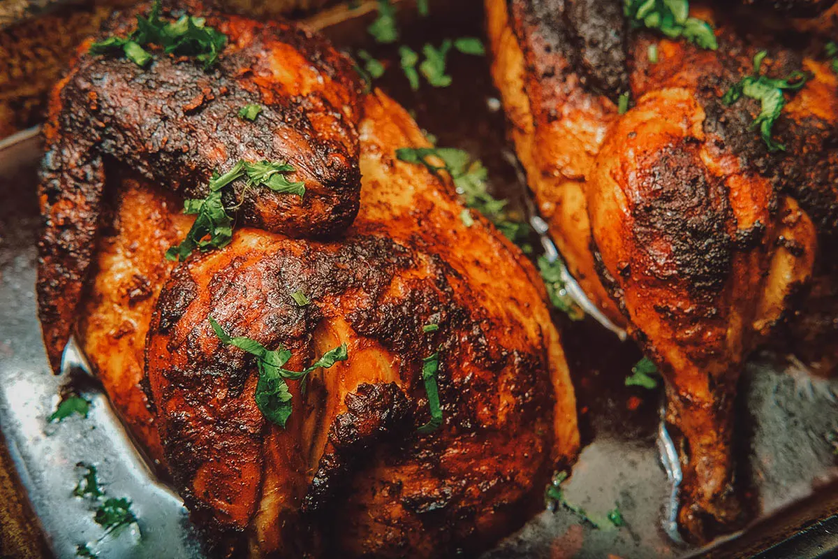 Peruvian Food Pollo a la Brasa or roast chicken, one of the most popular and delicious Peruvian foods