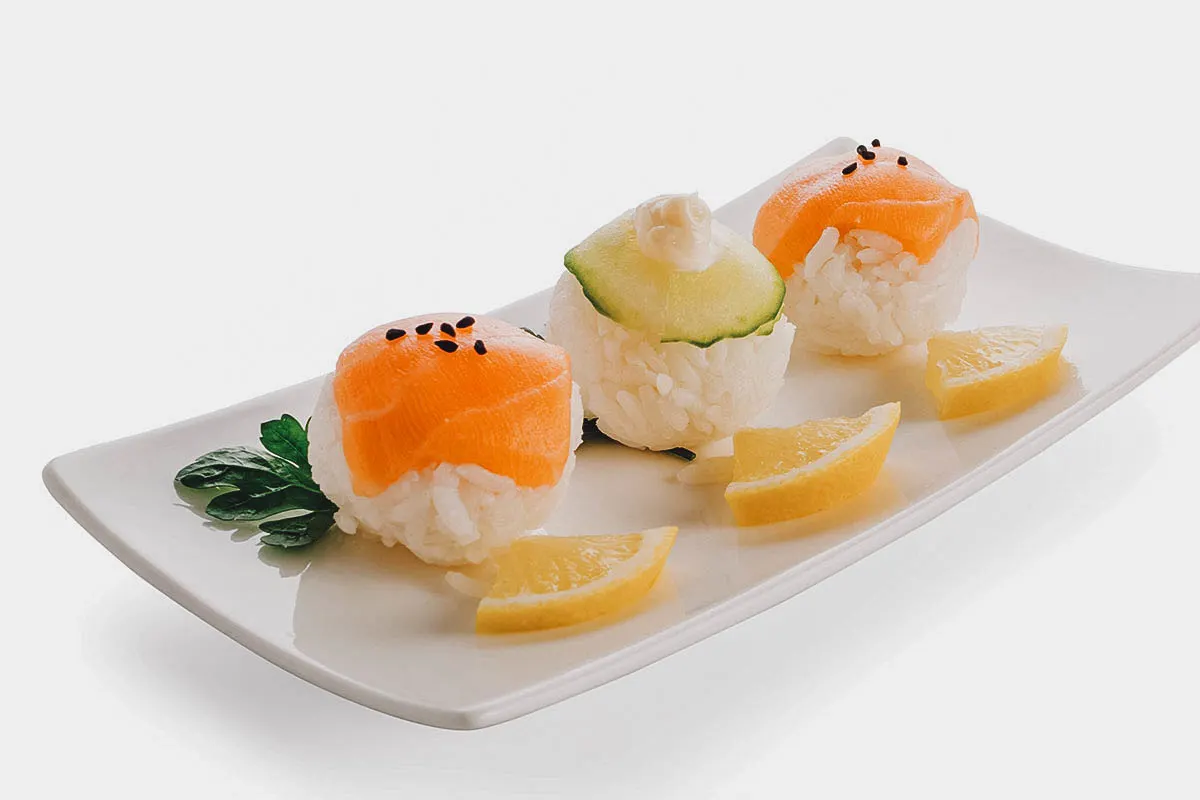 Sushi in Japan Temarizushi or sushi balls topped with sesame seeds
